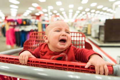 Crying Baby in a shopping cart